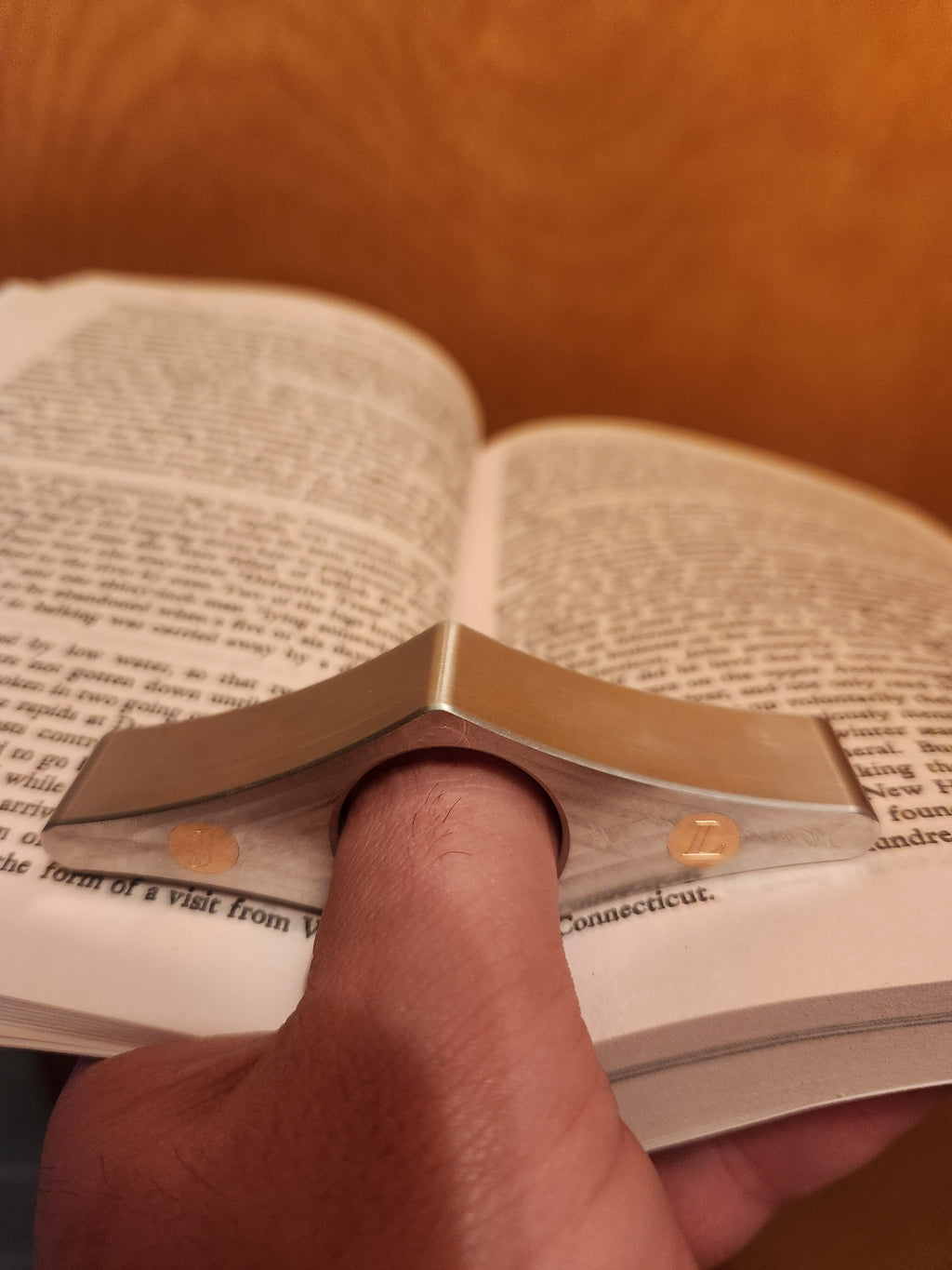 CNC machined page holder
