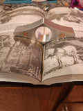 CNC machined page holder